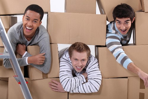 Stacked cartons and wrapped belongings ready for lawful transport