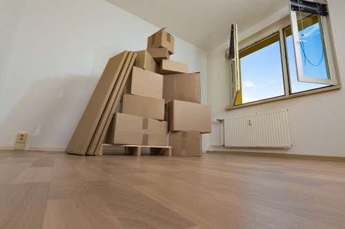 Sutton man and van service loading furniture into a vehicle