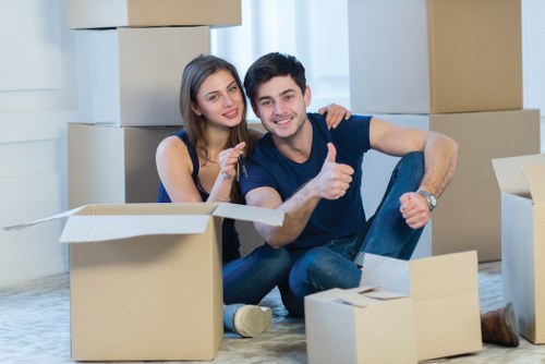 Sutton moving service with boxes and transport van
