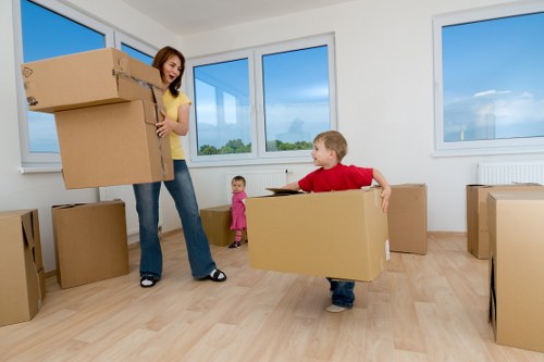Team of movers in Sutton planning a careful home relocation